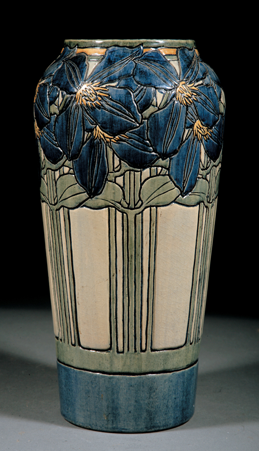 Neal Auction Co. set a world auction record for Newcomb Pottery in June 2009 when this high glaze vase, decorated in 1904 by Marie de Hoa LeBlanc with an incised design of Jackmanii Climbing Clematis, brought $169,200 after spirited bidding (est. $35,000-$50,000). Courtesy Neal Auction Co.